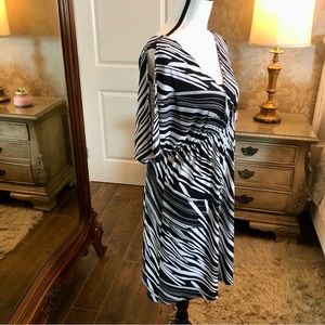 AGB knee length dress with peek-a-boo sleeve - Size 14